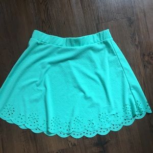 Mint skater style skirt with scalloped trim